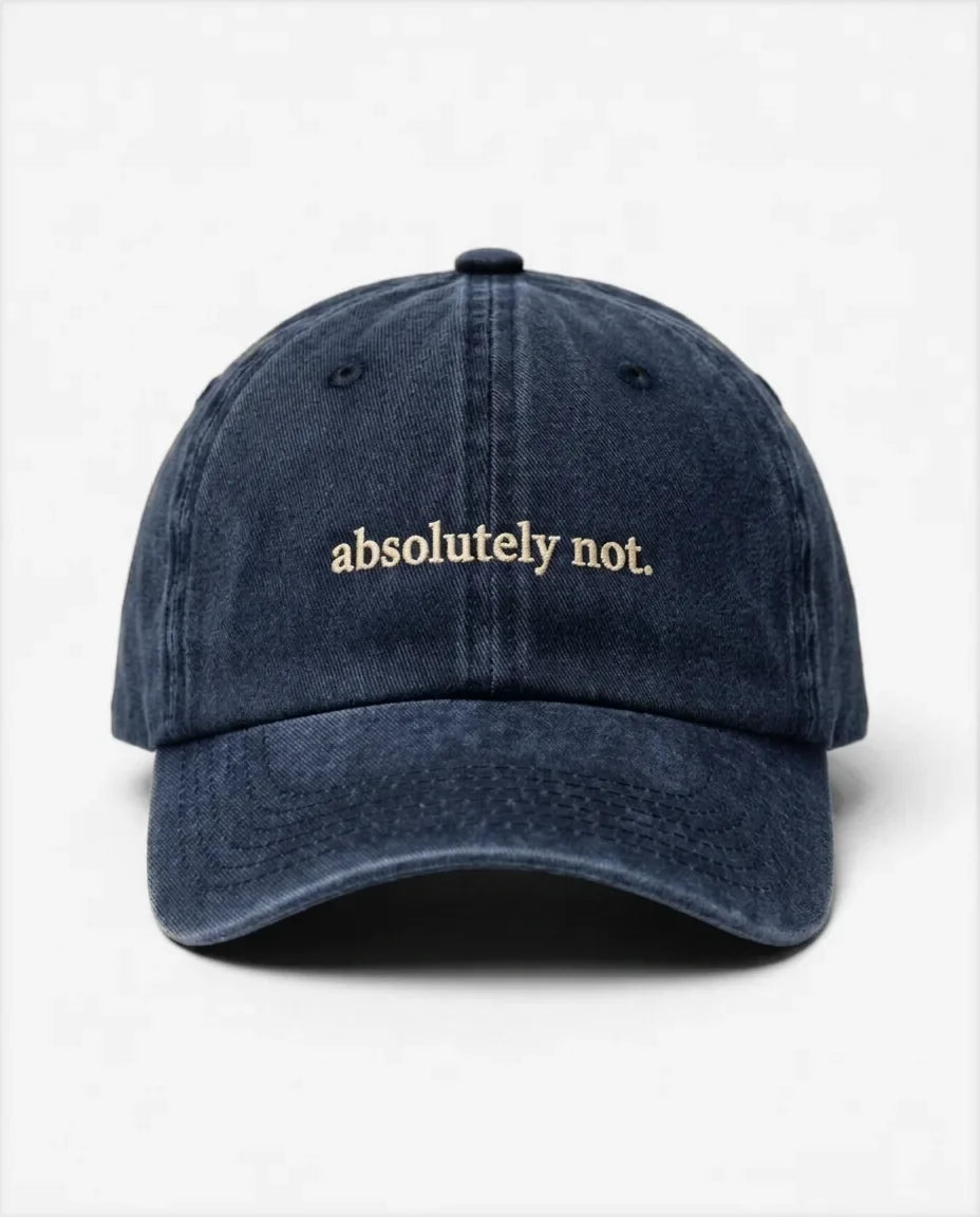 Absolutely not dad hat in Blu navy, front view: embroidered 'absolutely not.' lettering, washed cotton