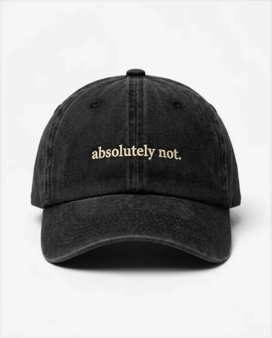 Absolutely not dad hat in Black, front view: embroidered 'absolutely not.' lettering, washed cotton
