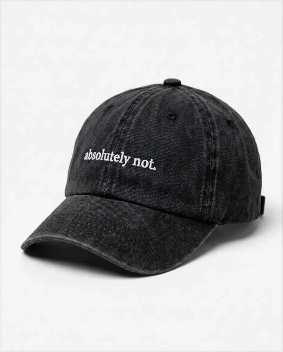 Absolutely not dad hat in Black, side view: embroidered 'absolutely not.' lettering, washed cotton