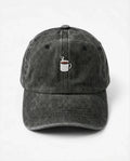 Coffee Cup dad hat in Black, front view: embroidered coffee cup, washed cotton