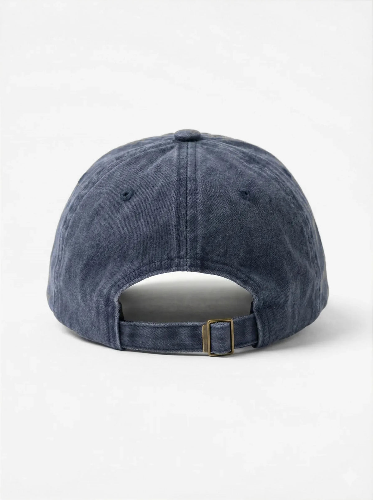 Leave me alone. dad hat in Blu navy, back view with brass buckle strap