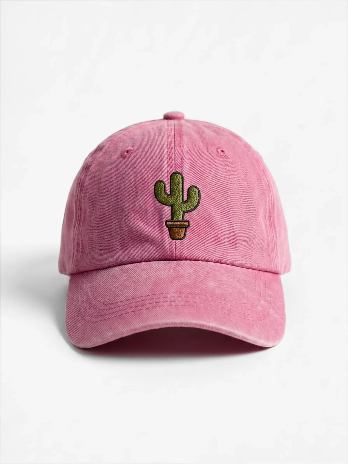 The Cactus dad hat in Rose, front view: embroidered potted cactus, washed cotton