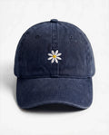 The Daisy dad hat in Blu navy, front view: embroidered daisy, washed cotton