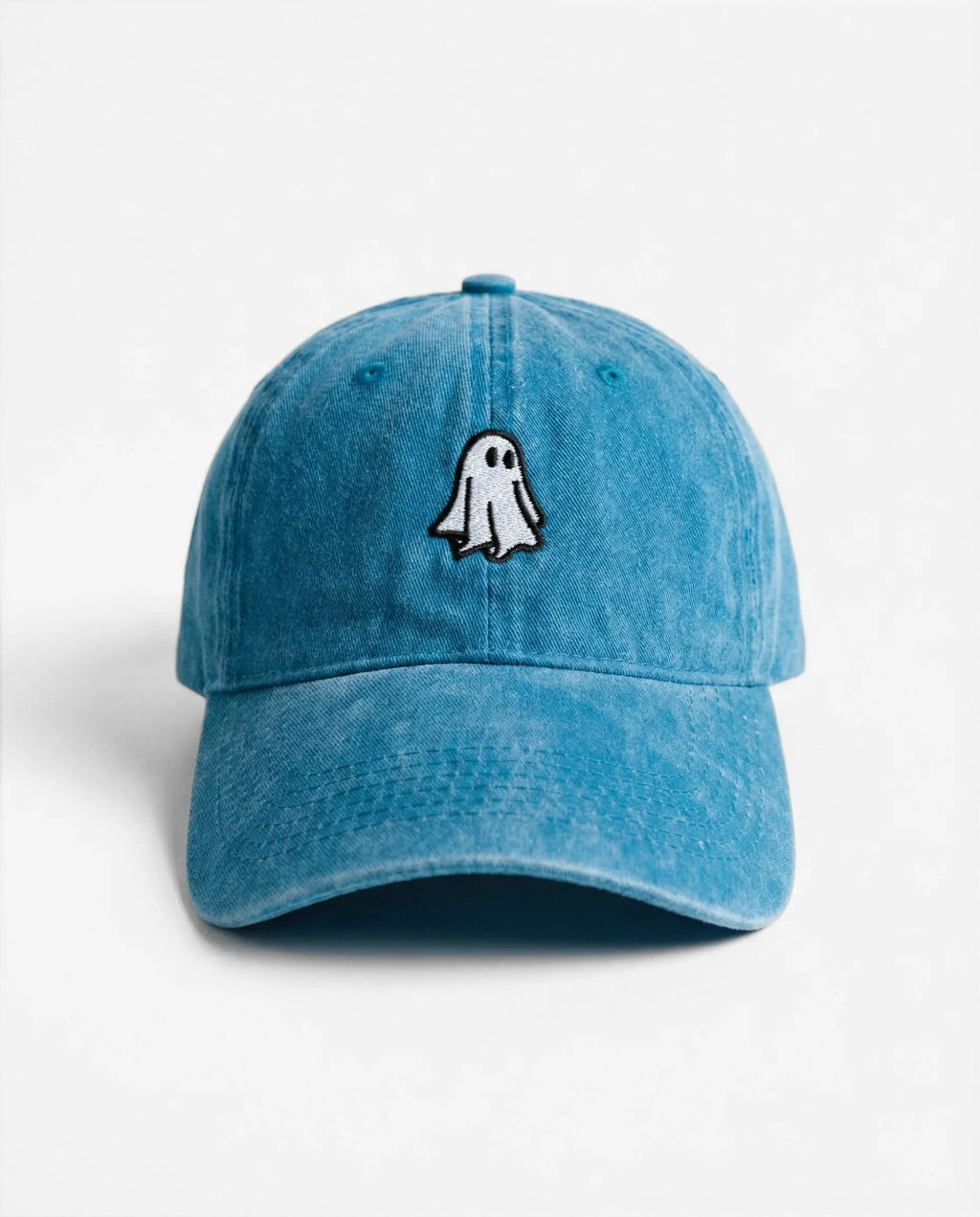 The Ghost dad hat in Lake Blue, front view: embroidered little ghost, washed cotton