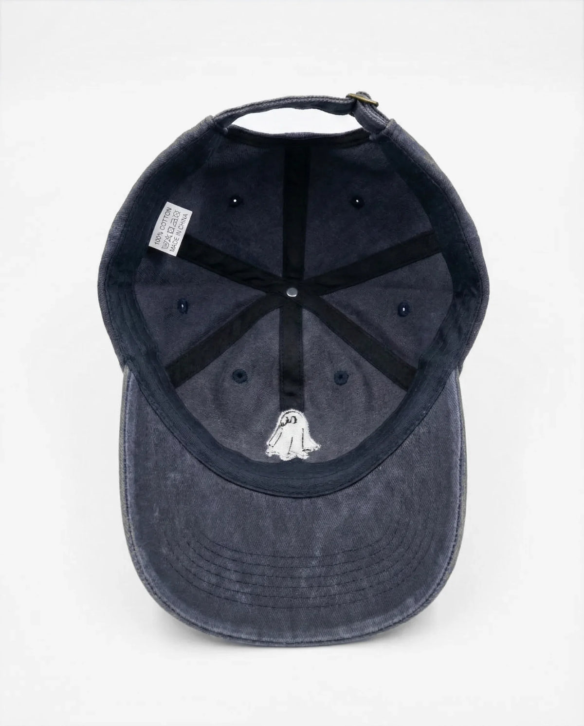 The Ghost dad hat in Blu navy, inside view with label